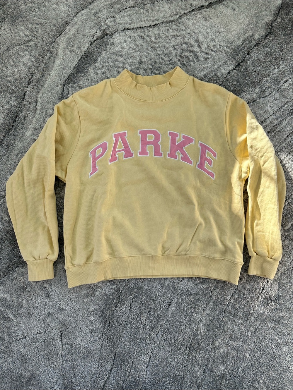 Parke Yellow mockneck Sweatshirt with Pink Lettering